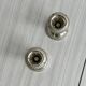 Set of 2 vintage silver-plated metal candle holders.