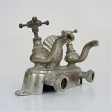 Old bathtub faucet, kitchen in silvered bronze with its shell-shaped soap dish