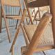 Serie de 4 chaises pliantes vintage italienne en cannage 1970s