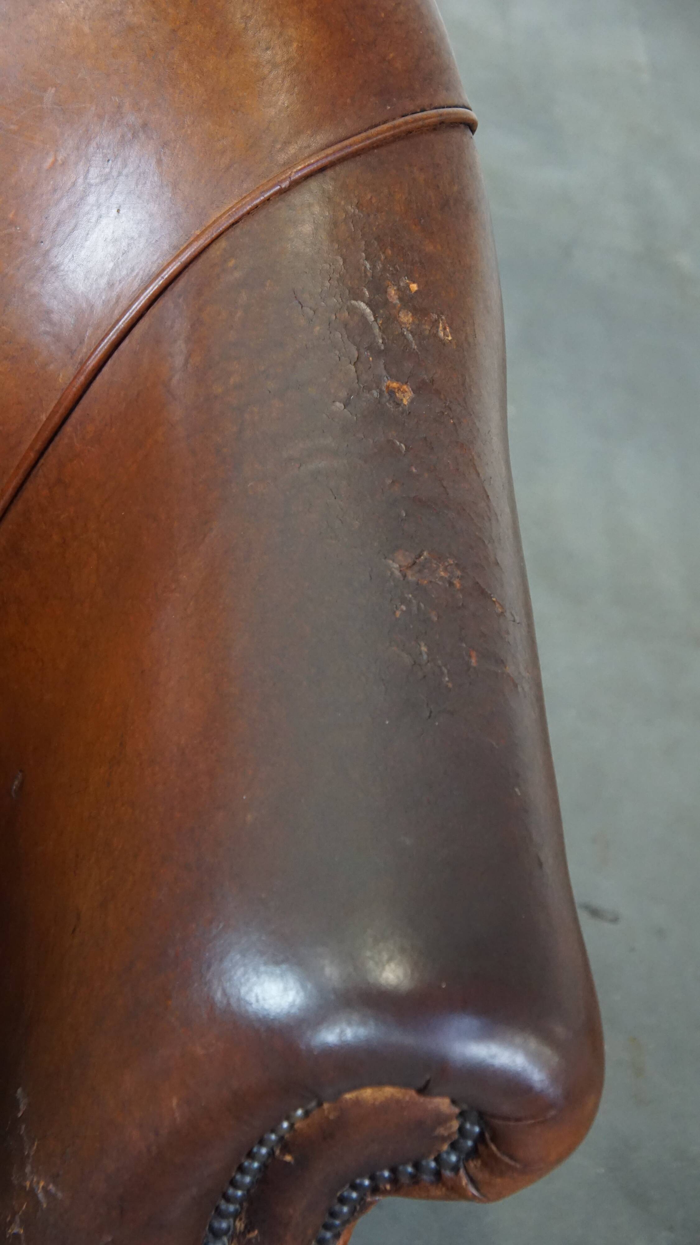 Vintage club armchair in sheepskin leather