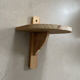 Small wall-mounted wooden shelf