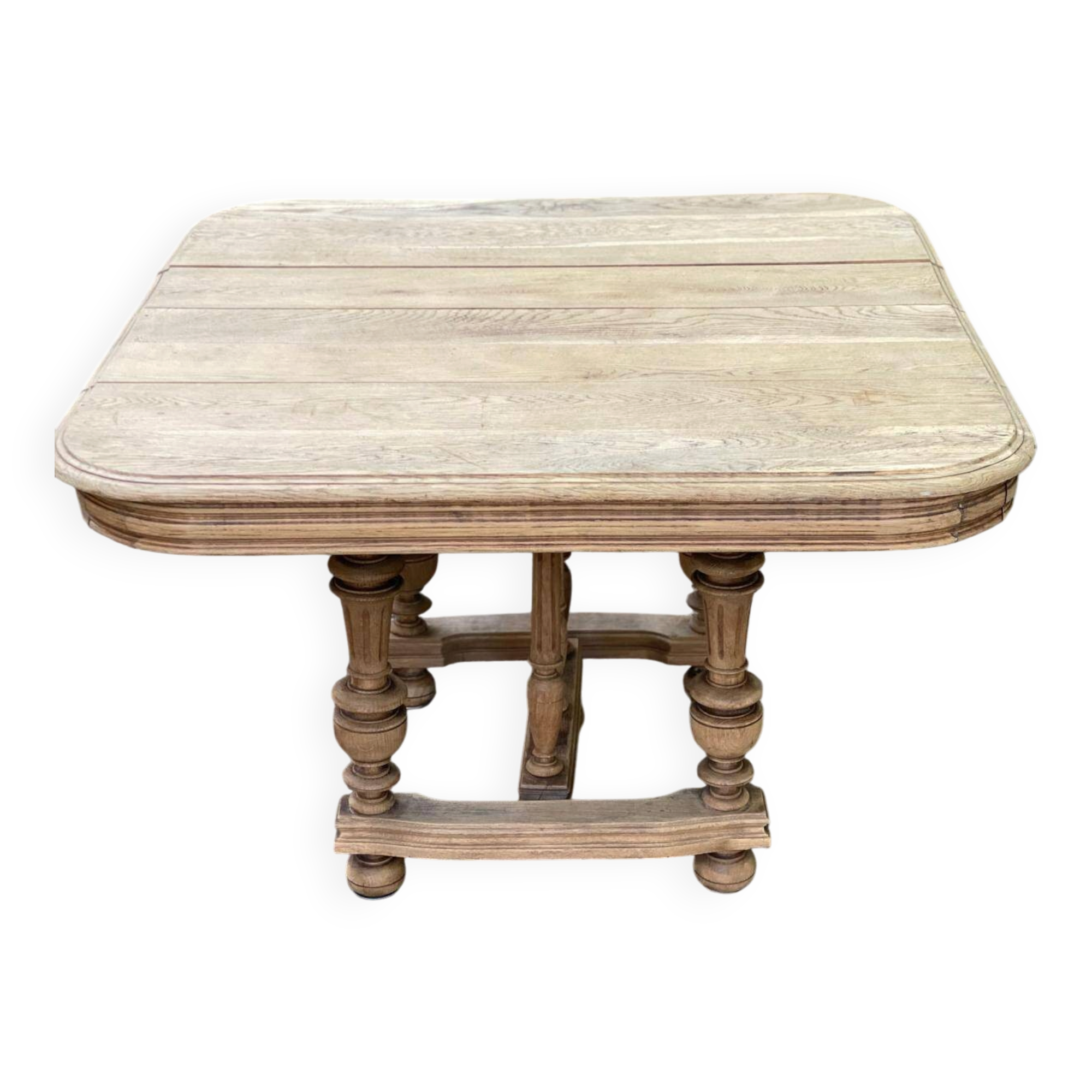 Henri II dining table stripped in solid oak from the 19th century.