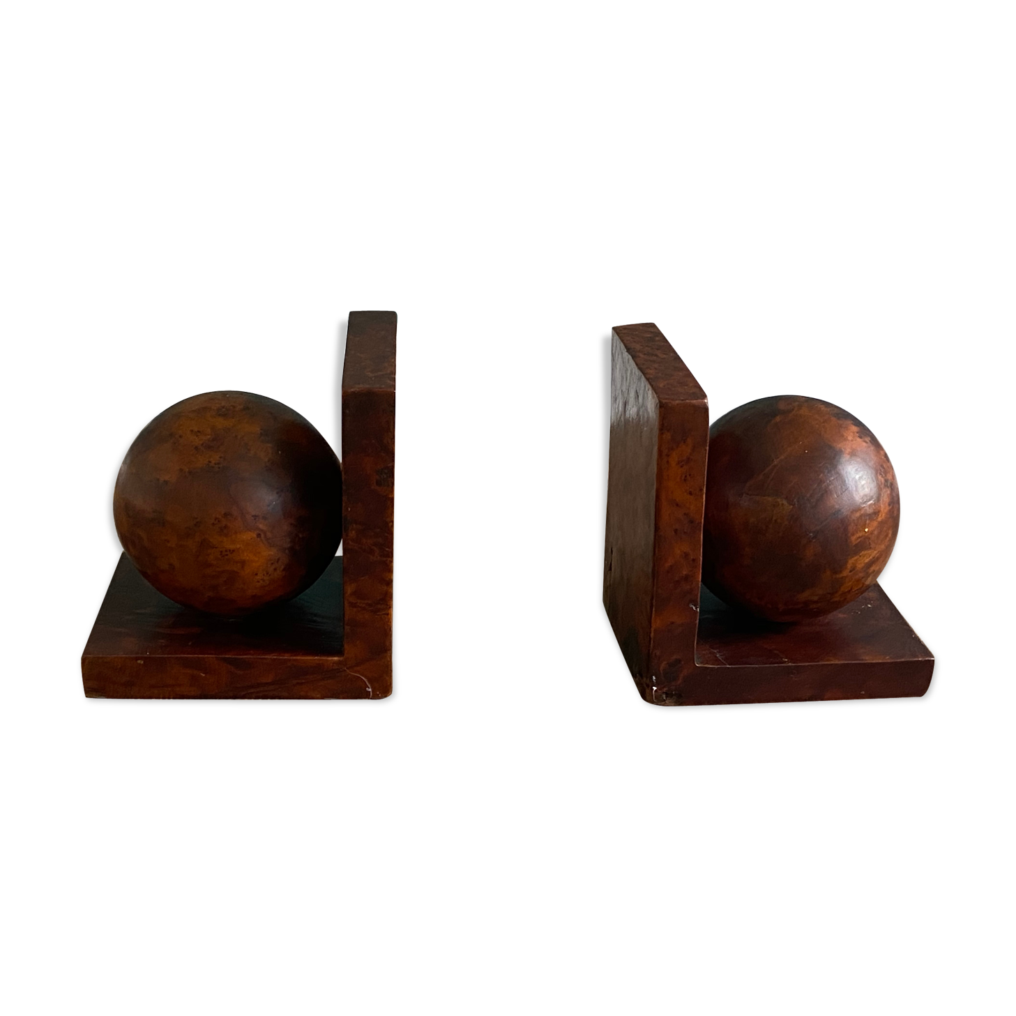 Pair of bookends adorned with spheres