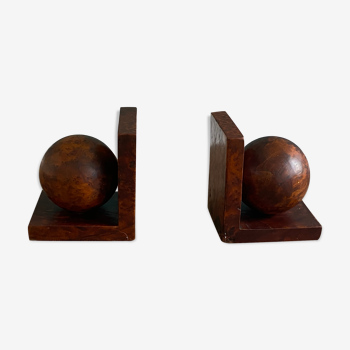 Pair of bookends adorned with spheres