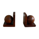 Pair of bookends adorned with spheres