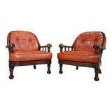 Pair of 60s armchairs in leather and wood