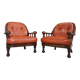 Paire de fauteuils années 60 en cuir et bois