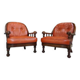 Pair of 60s armchairs in leather and wood