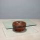 Vintage coffee table with a glass top and a terracotta base, 20th century.