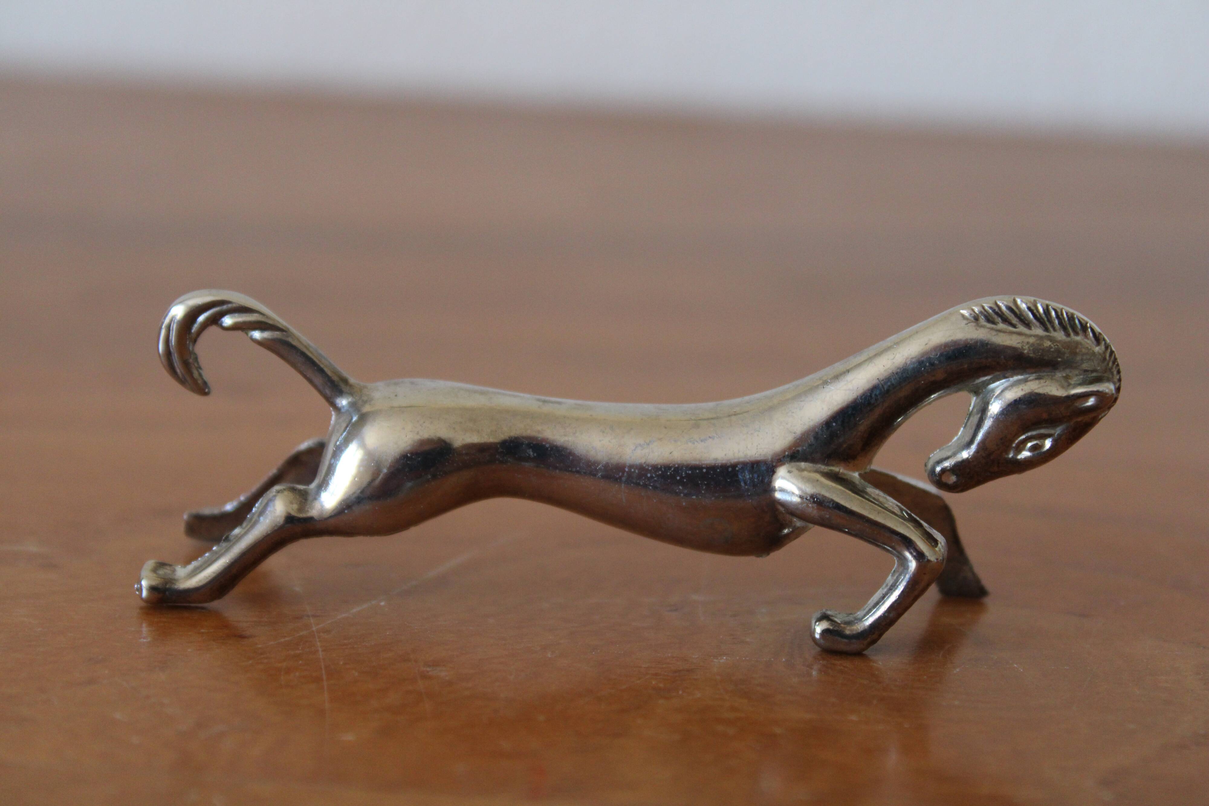 Set of 12 vintage knife rests, in silver metal