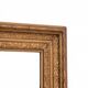Miroir dans un cadre décoratif en or, Pologne, début du XXe siècle.