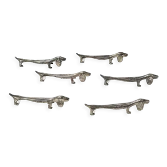 Six silver metal knife holders dachshund shaped