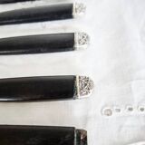Silver and ebony table knives, stainless steel blade, late 19th century.