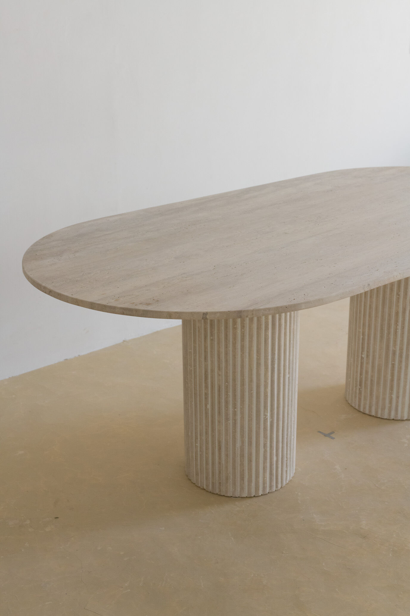 Olya oblong dining table 150x90 in natural travertine