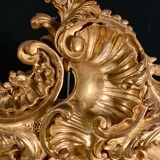 Large oval mirror in gilded wood