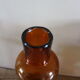 Vase flacon en verre ambré
