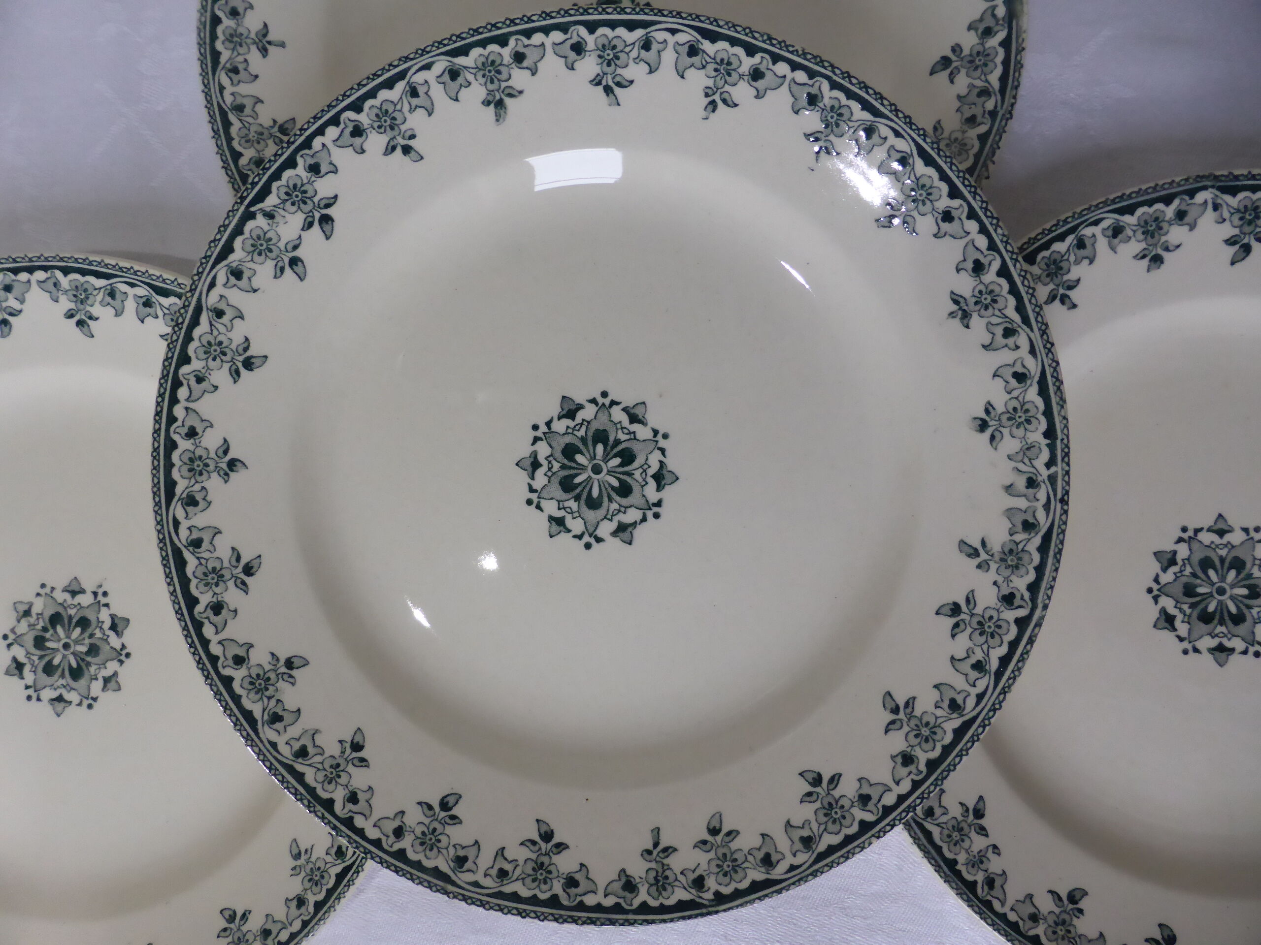 4 vintage flat plates in iron earth from HBC