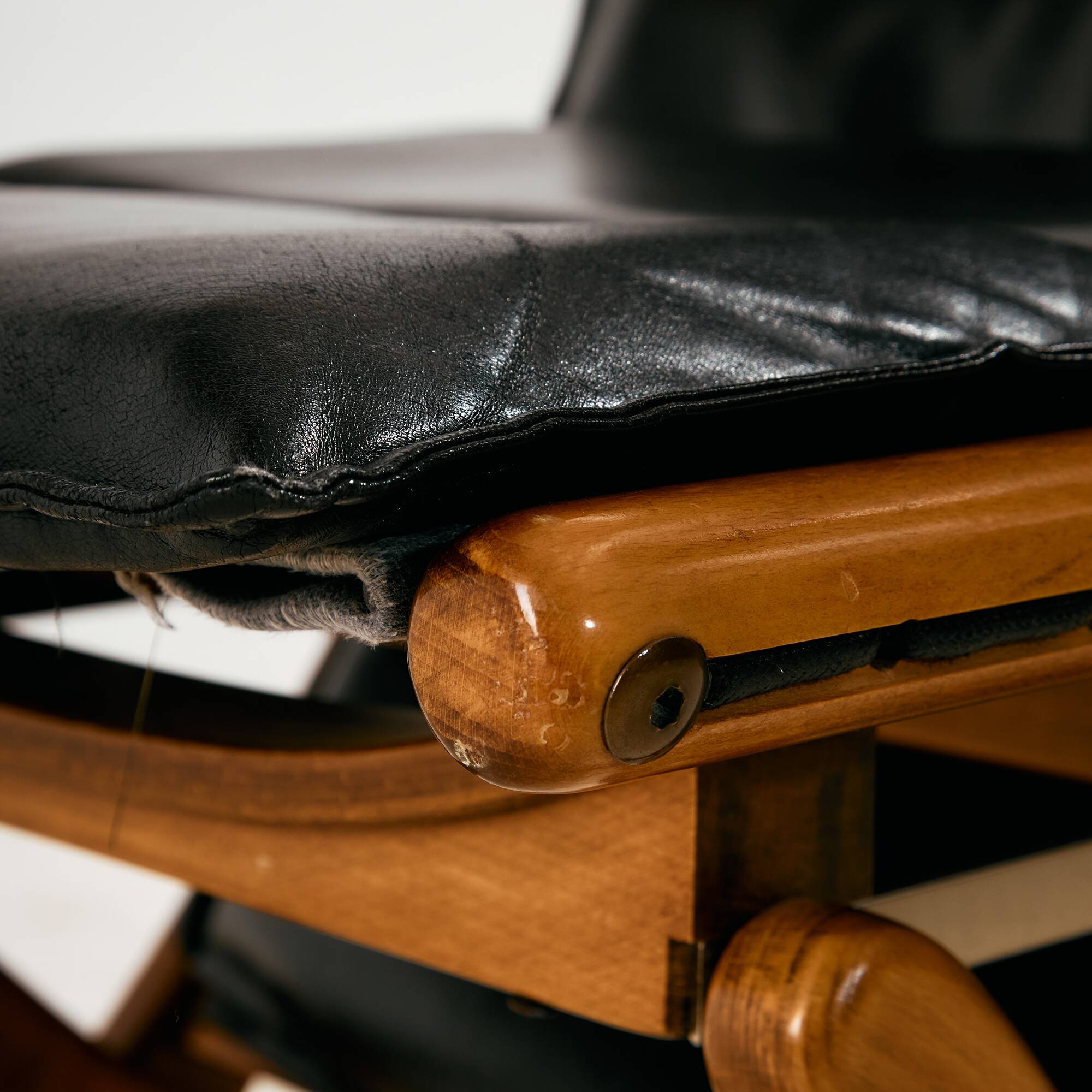 Beech armchair with leather upholstery