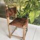 Unique Hungarian handcrafted chair in oak and leather.