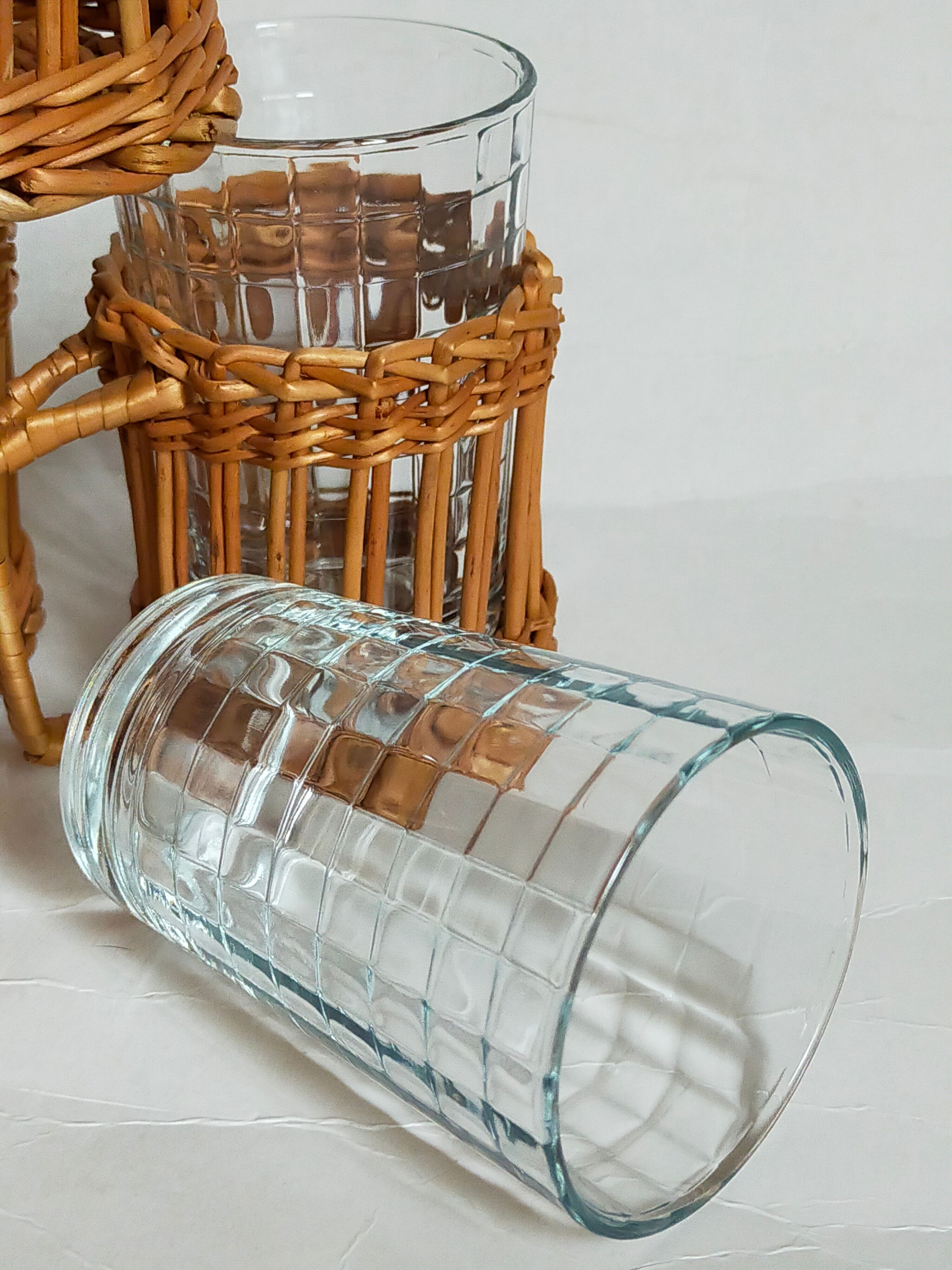 Six vintage 50s glasses in braided rattan cases