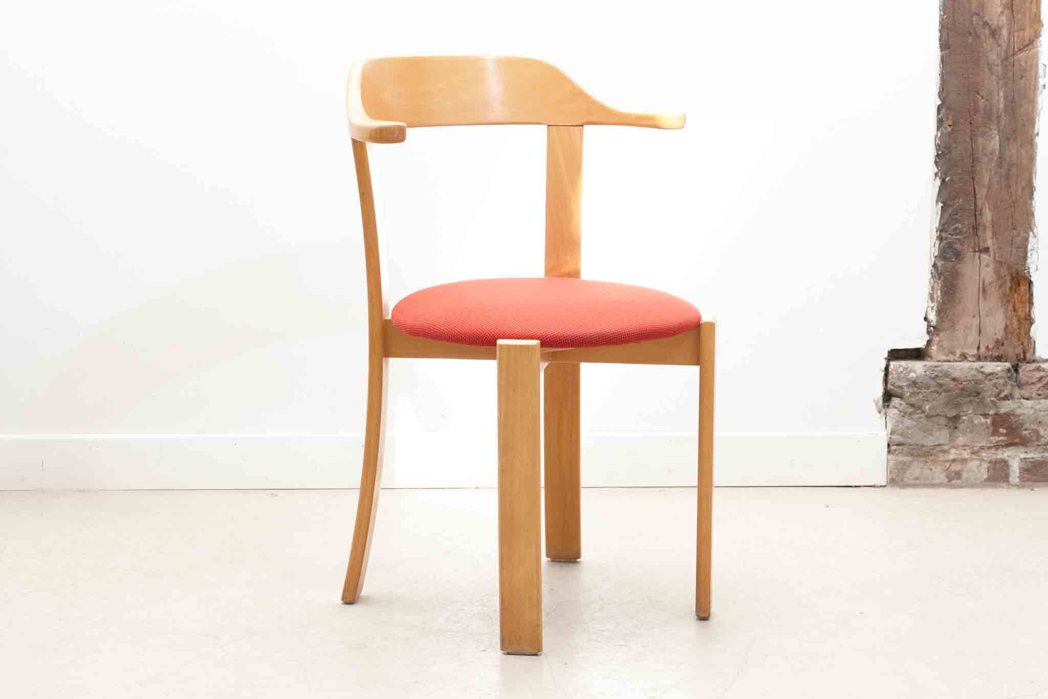 Horn chair upholstered in red and beech