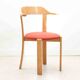 Horn chair upholstered in red and beech