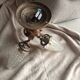 Vintage brass wall/ceiling light with 3 arms / moulded glass