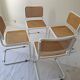 B32 chairs by Marcel Breuer in white.