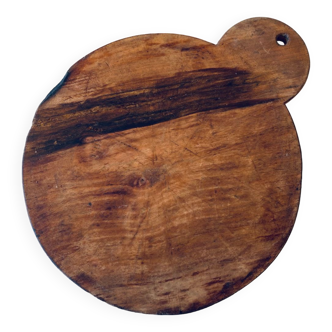 Old round wooden cutting board