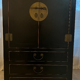 Asian-inspired black lacquered wooden wardrobe
