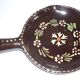 Brown ceramic pan, flower decorations