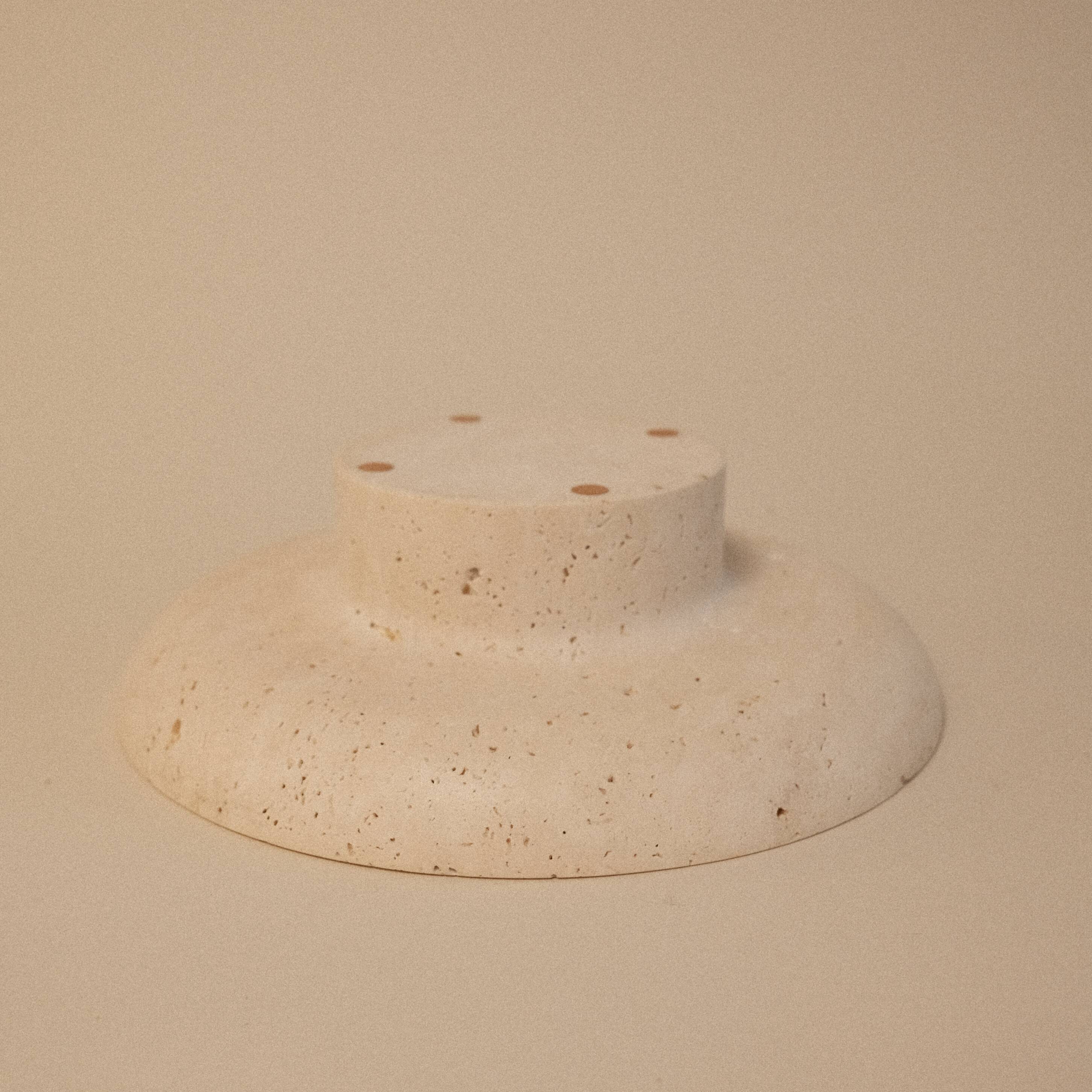 Travertine pocket emptier