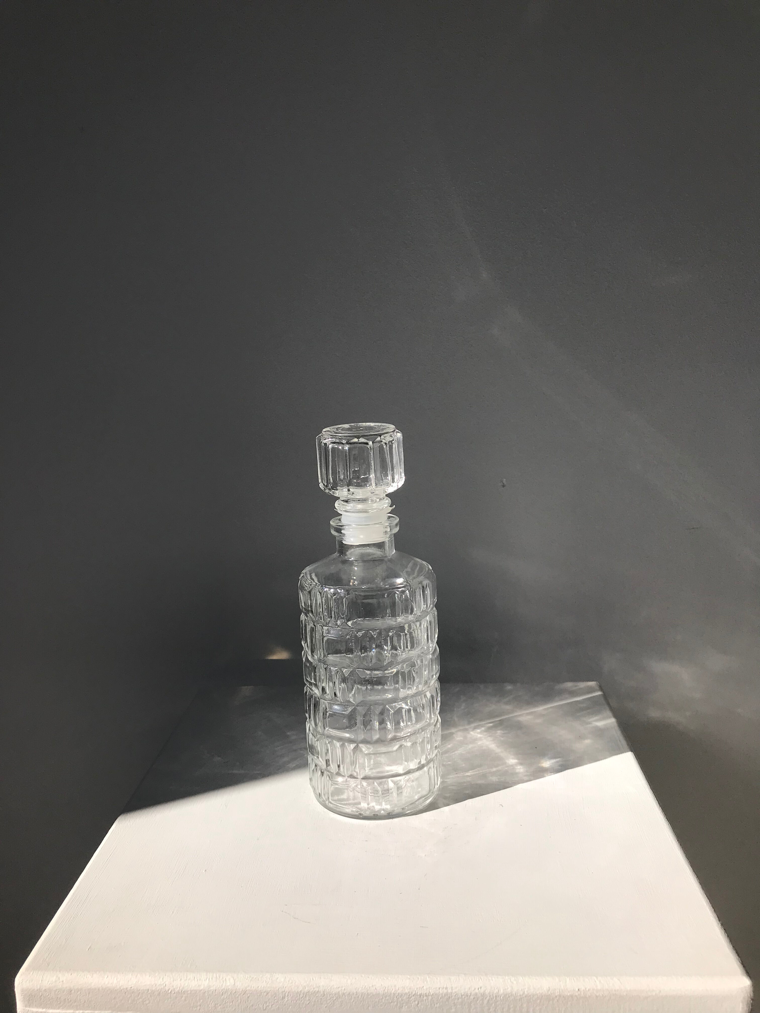 Vintage whisky decanter in glass