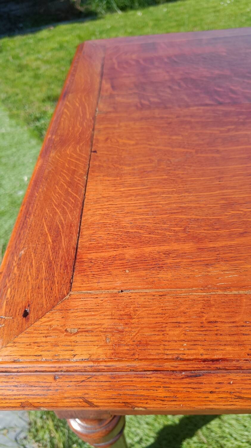 Antique solid wood table with a through drawer.