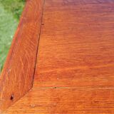 Antique solid wood table with a through drawer.