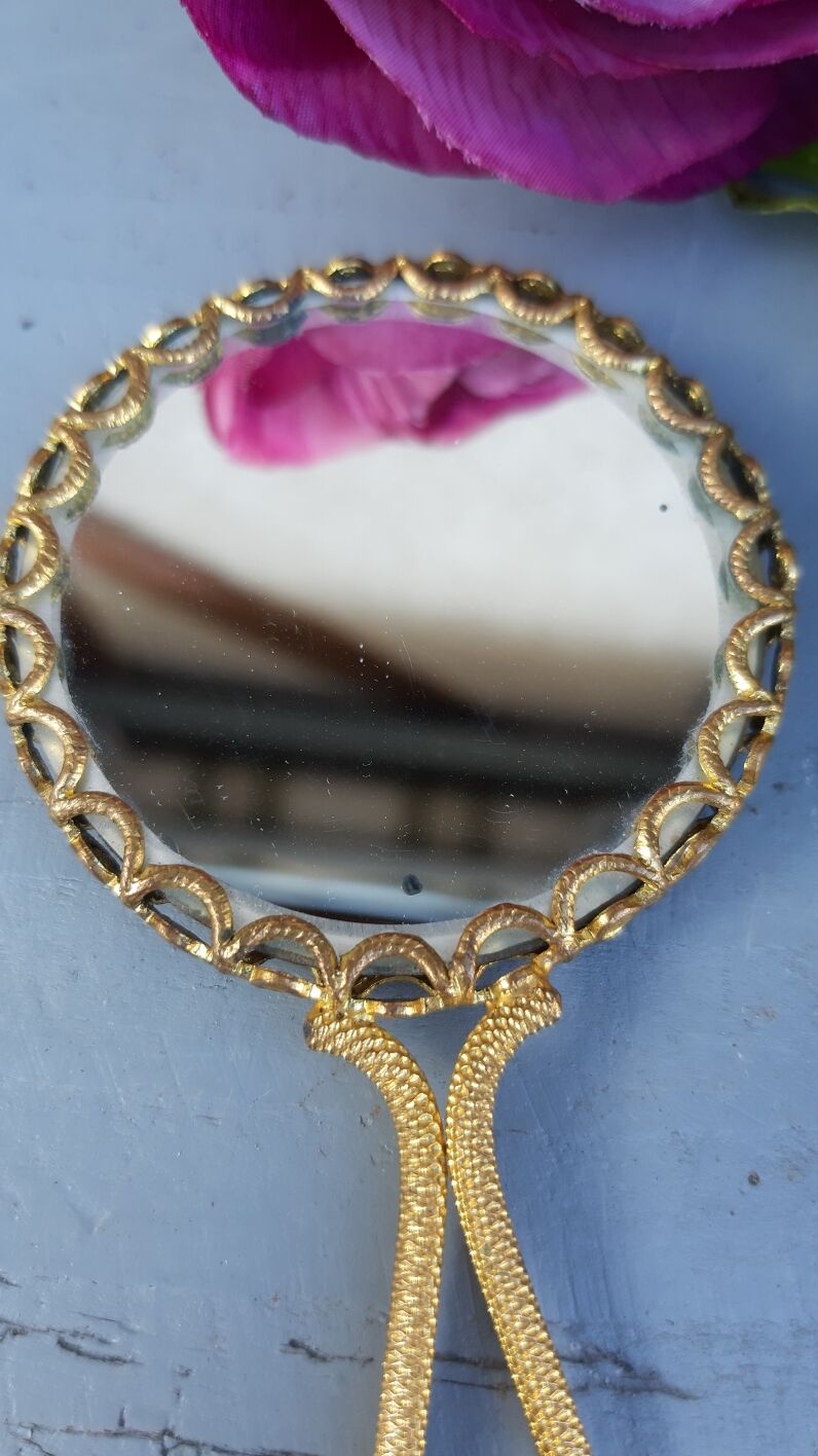 Miroir à main en laiton