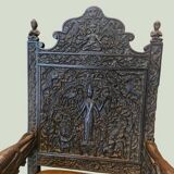 Indian throne chair in carved red wood - Buddhist / Hindu.