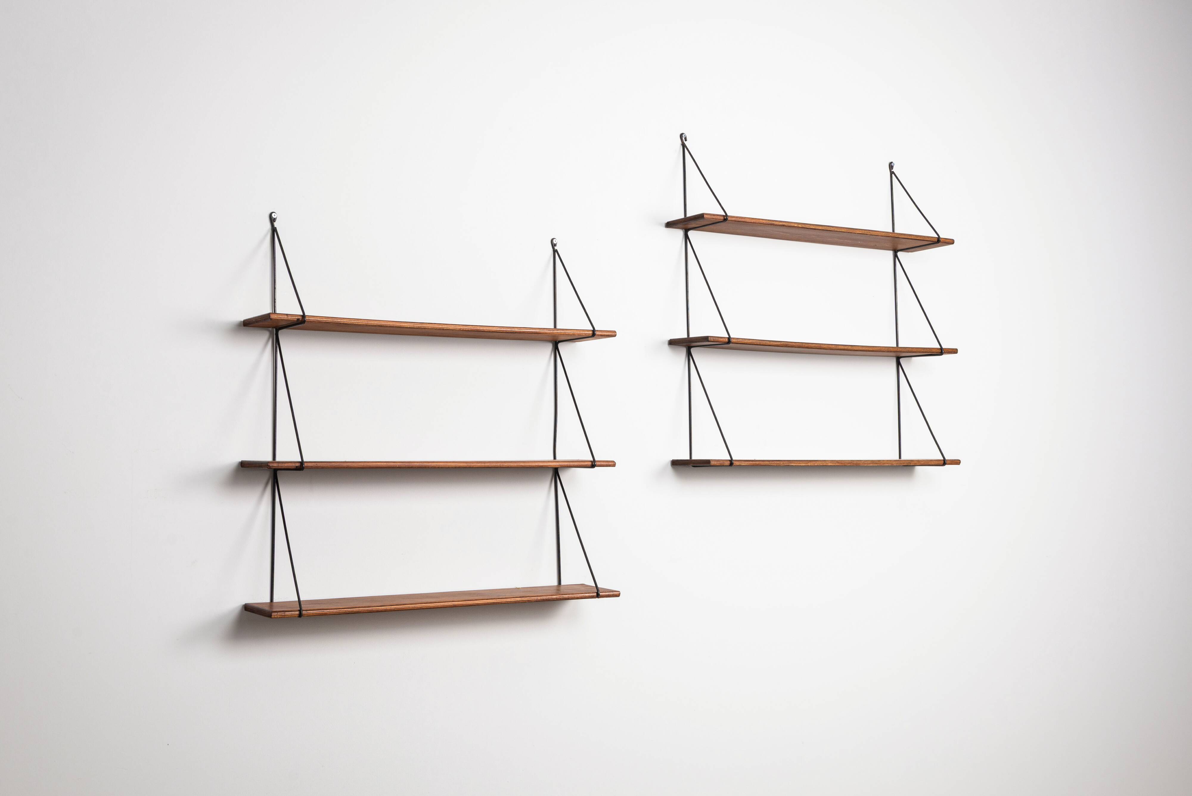 Set of minimalistic wooden shelving units