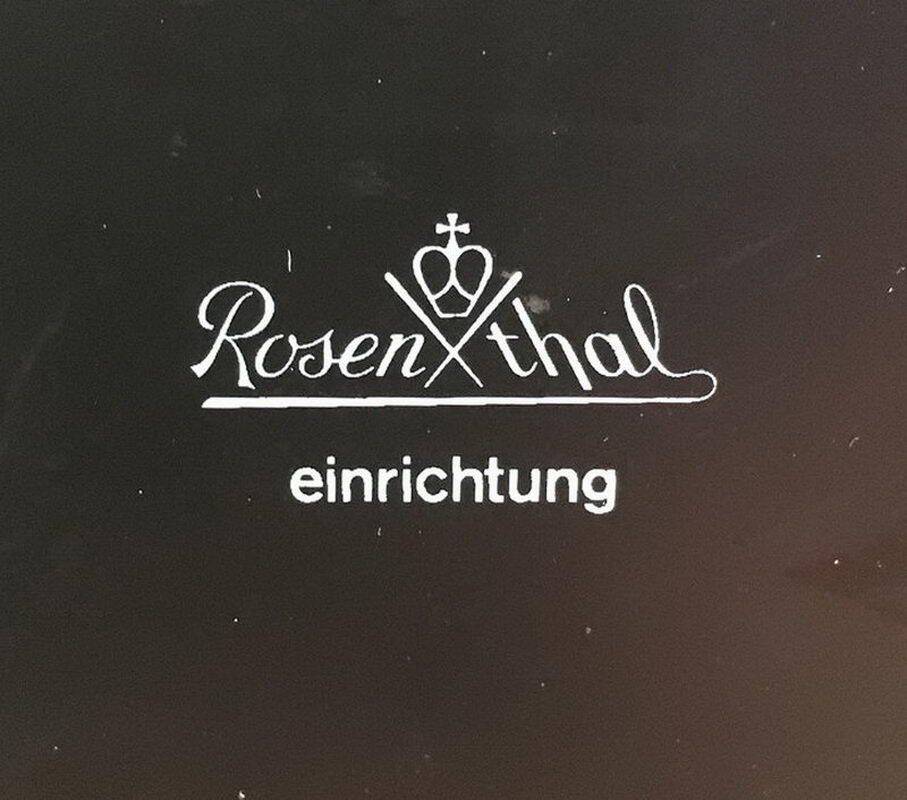 Set of 4 armchairs in leather and black lacquered metal. Rosenthal