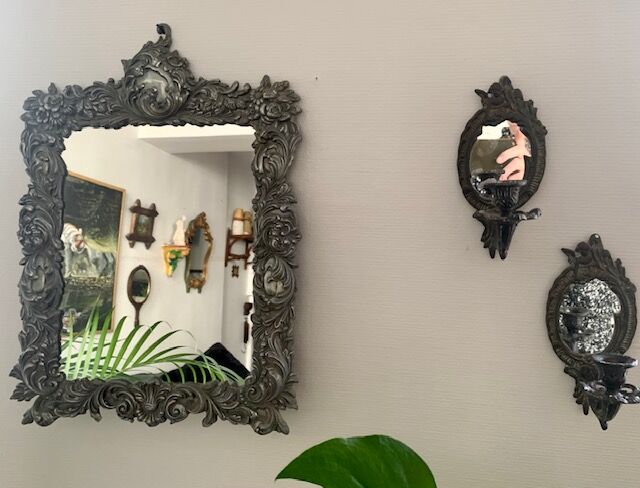 Antique Italian mirror in repoussé silver metal
