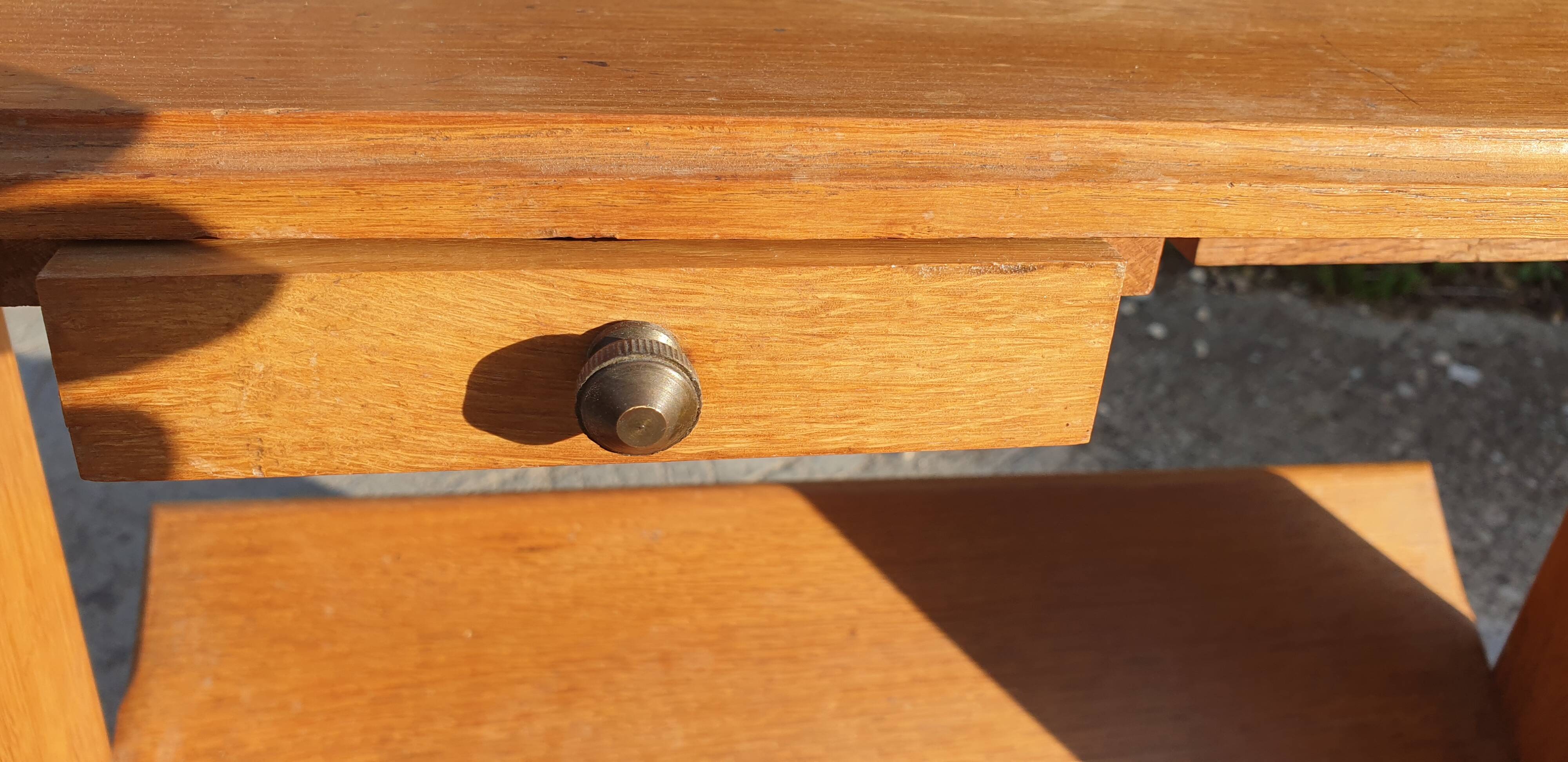 Magazine rack with sliding drawers in light wood, Scandinavian style.