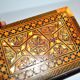 Vintage wooden box with straw marquetry and mother-of-pearl decoration.