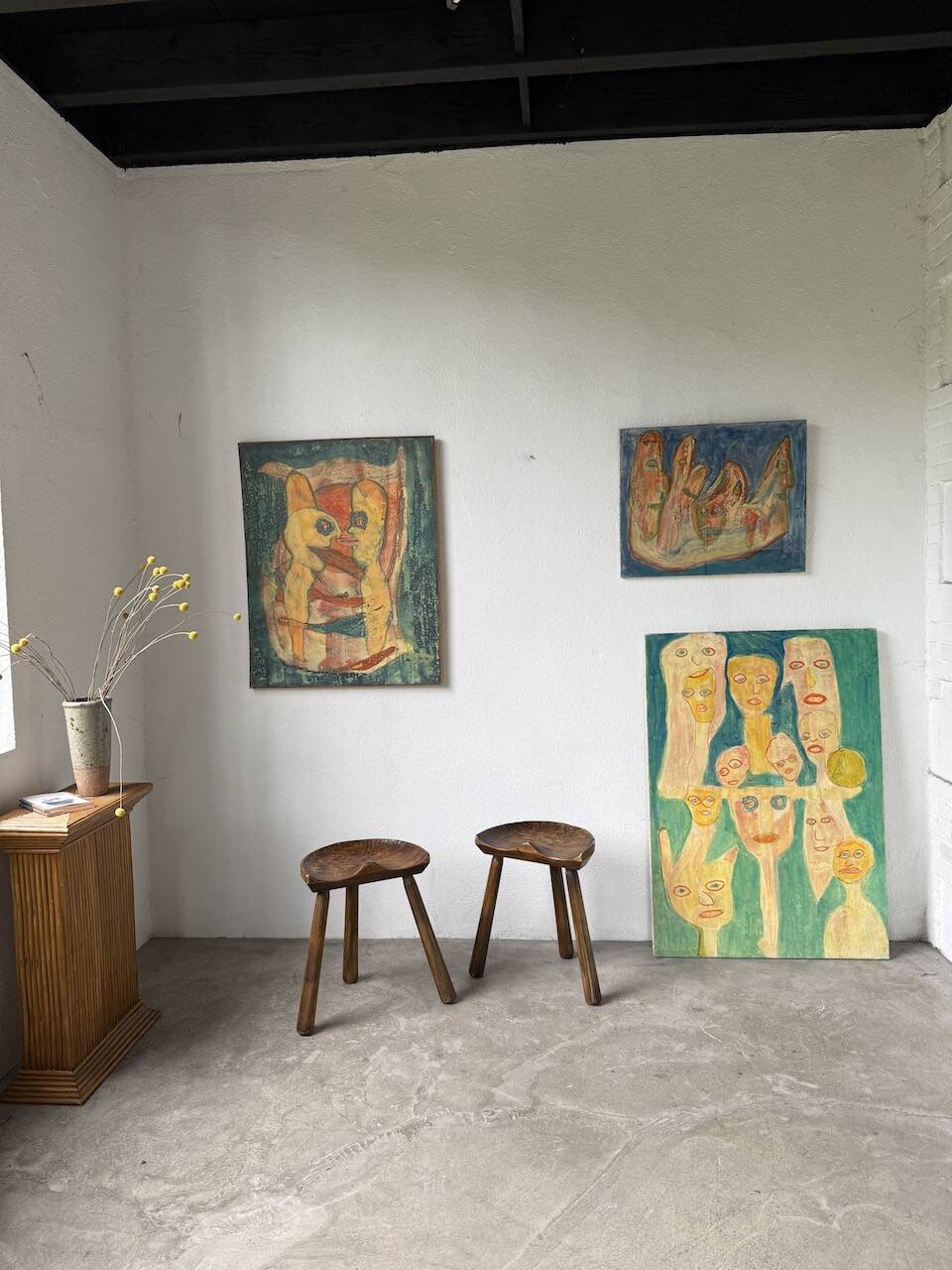 Pair of Le Selou tripod shepherd's stools