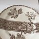 8 Terre de Fer dessert plates, 19th century