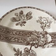 8 Terre de Fer dessert plates, 19th century