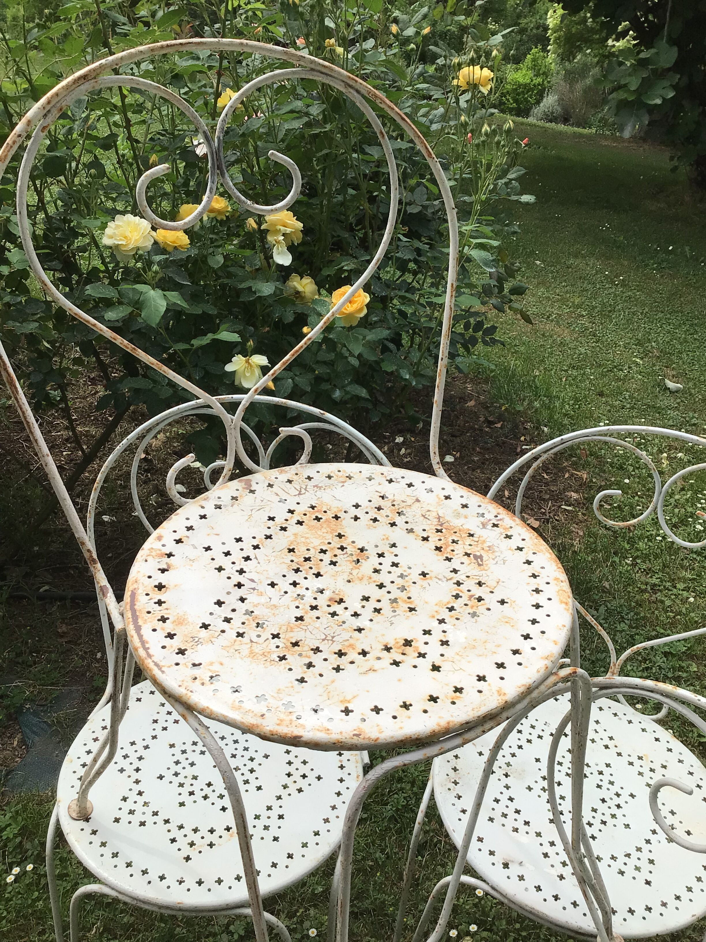 Suite de quatre chaises de jardin années 30