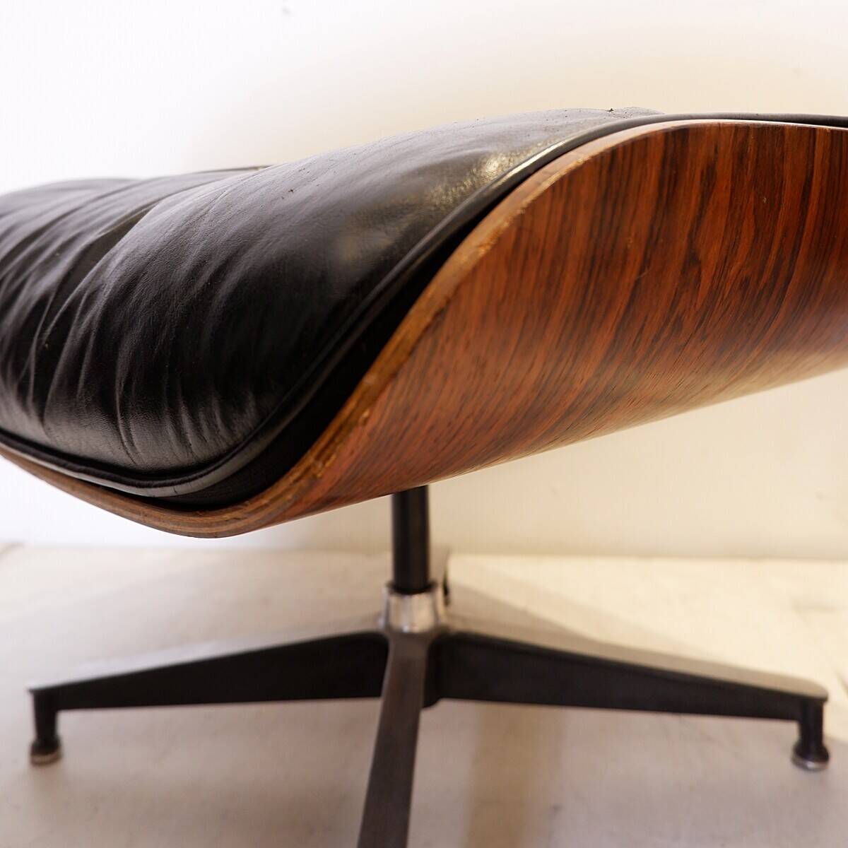 Mid-Century armchair and footrest by Charles & Ray Eames for Herman Miller