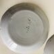 Pair of plates with naive Eastern rooster decoration