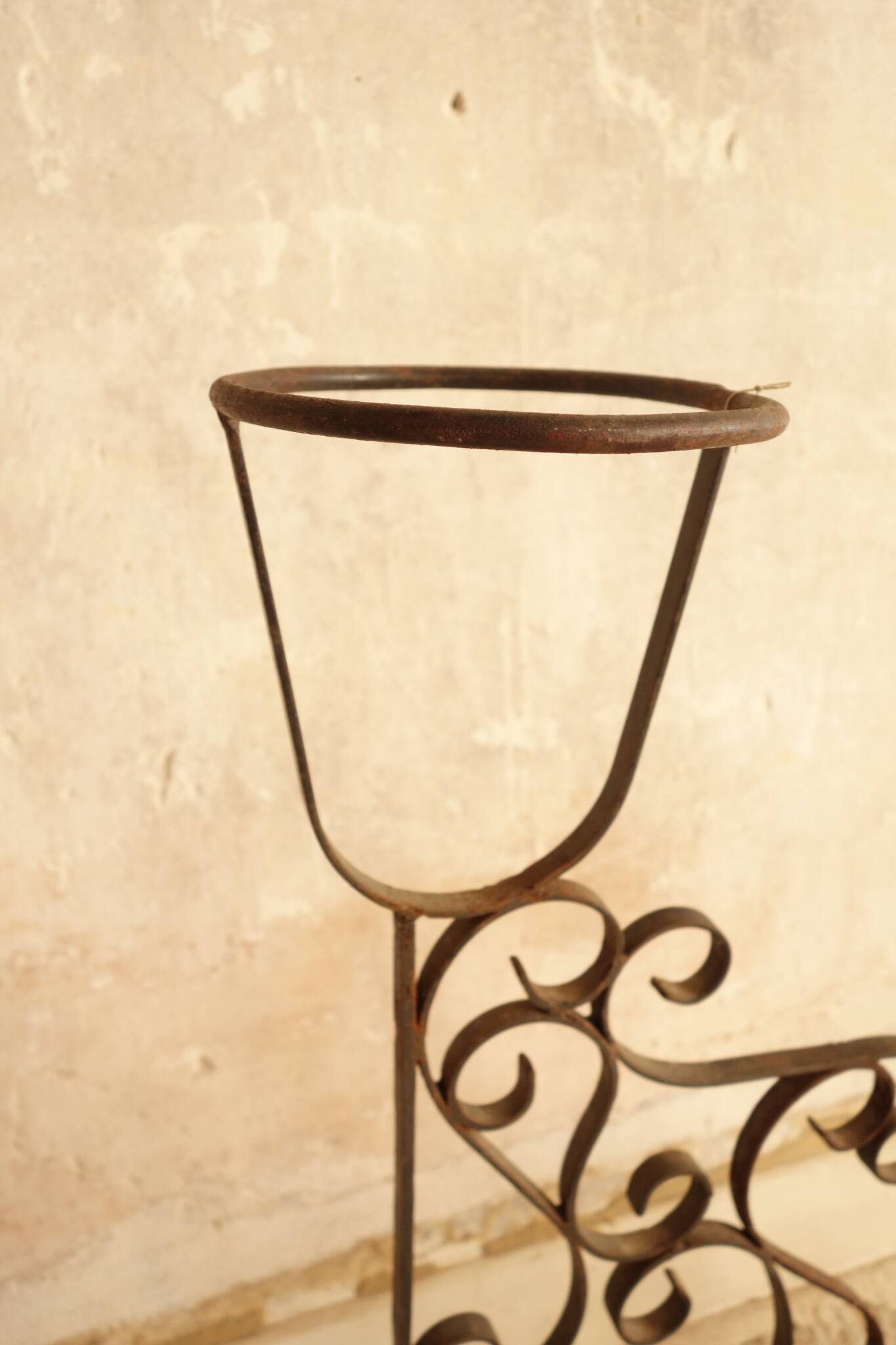 Antique wrought iron plant stand