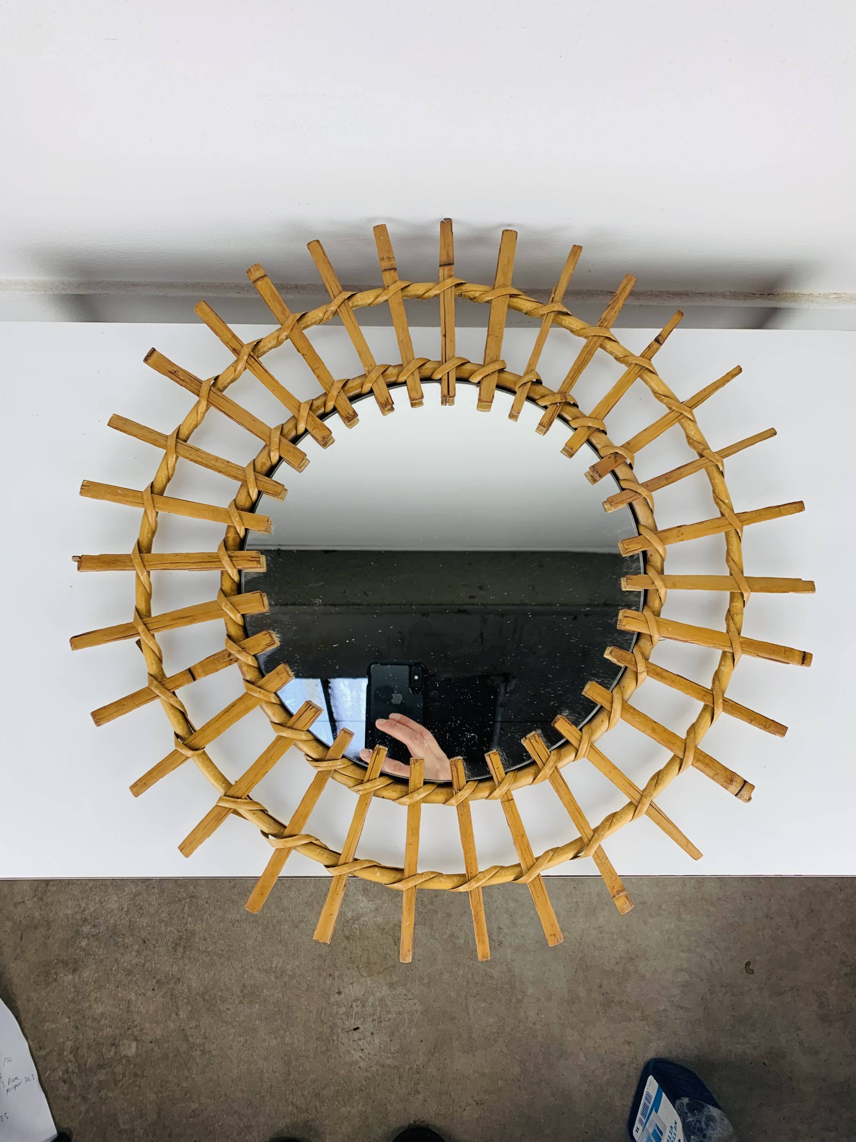 Vintage rattan sunburst mirror from the 1960s